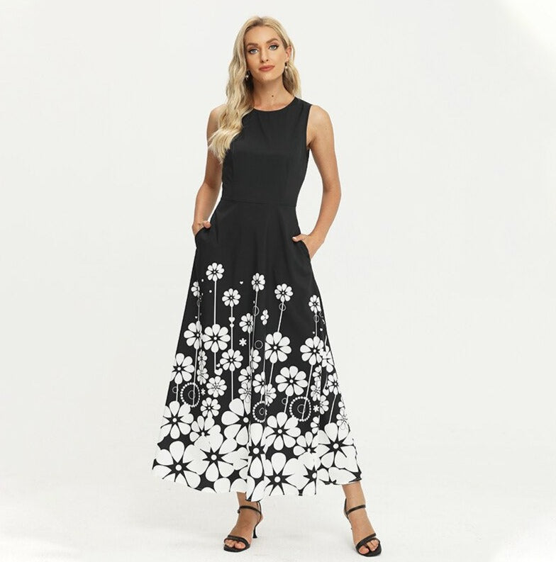 Woman  wearing an ankle-length vintage fit & flare dress with an O-neckline and captivating print, available in black.