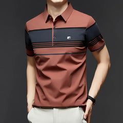Brown and navy striped polo shirt worn by a person on a dark background