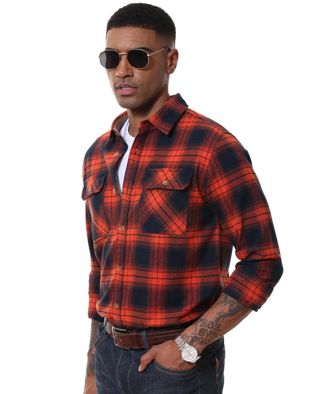 Man wearing a red and black plaid shirt on a white background