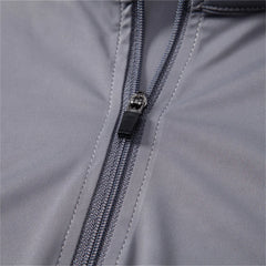 Close-up of a zipper on a gray jacket