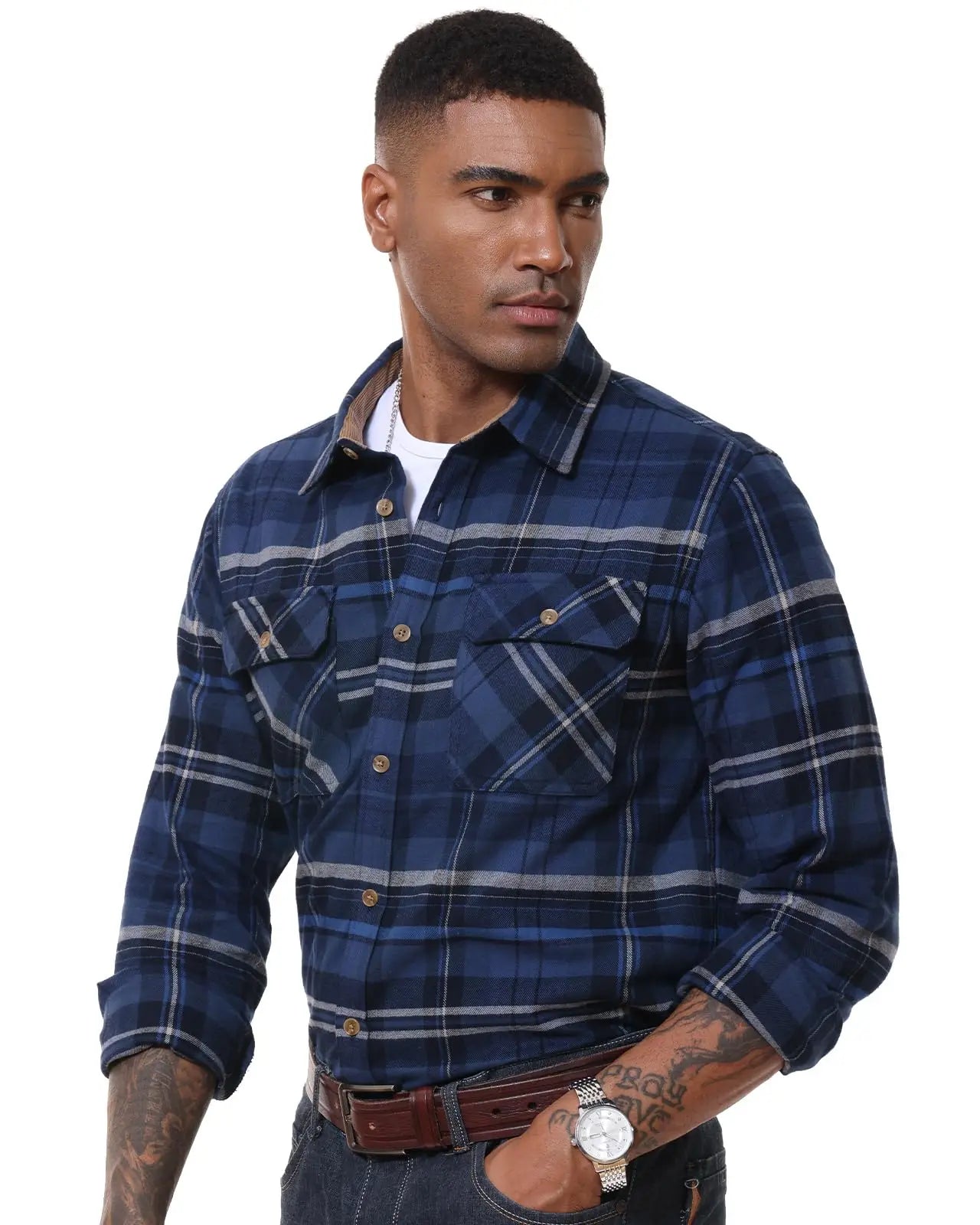 Man wearing a blue plaid shirt on a white background