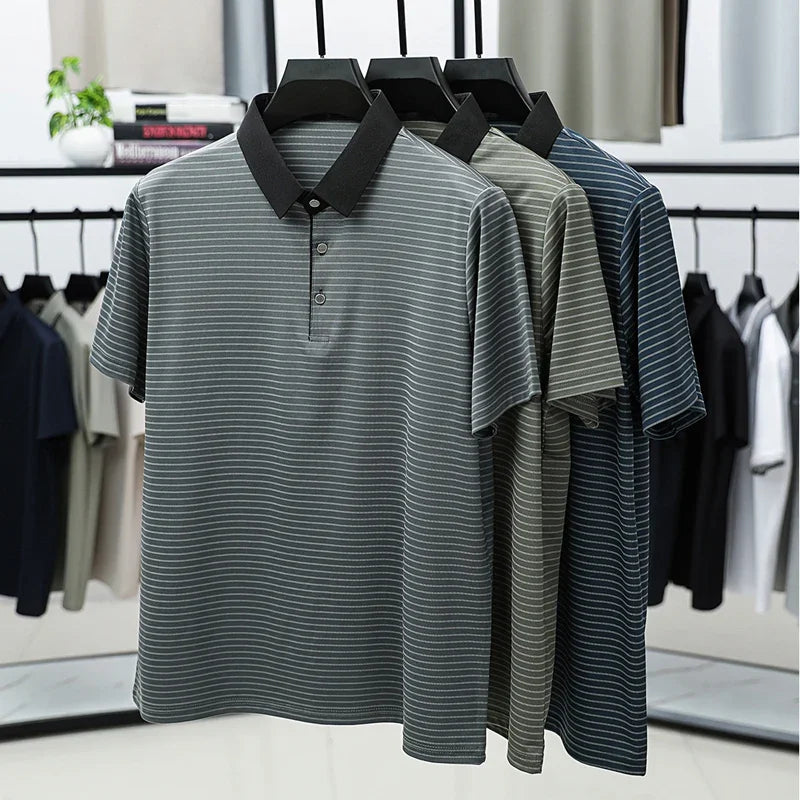 Striped polo shirts on hangers in a clothing store setting