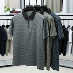 Striped polo shirts on hangers in a clothing store setting