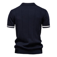 Navy blue polo shirt with white trim on a white background