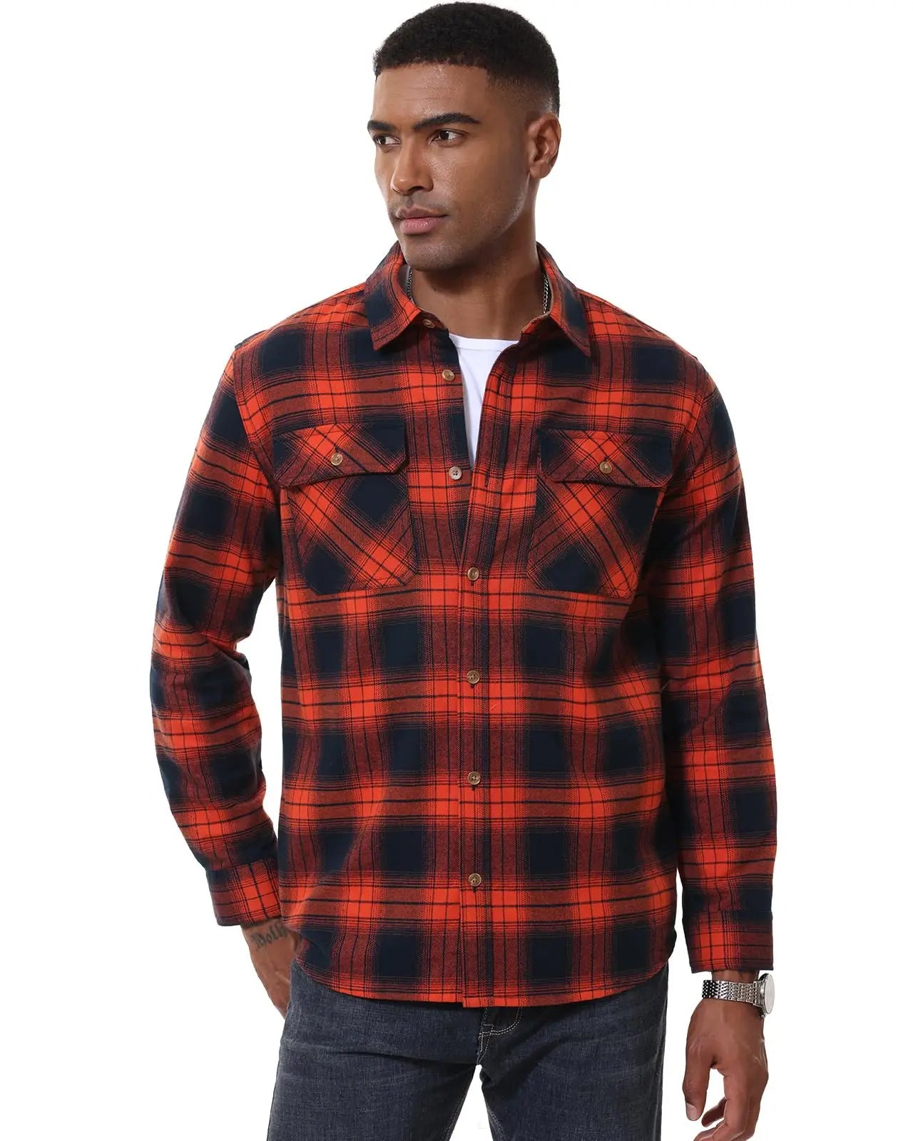 Man wearing a red and black plaid shirt on a white background