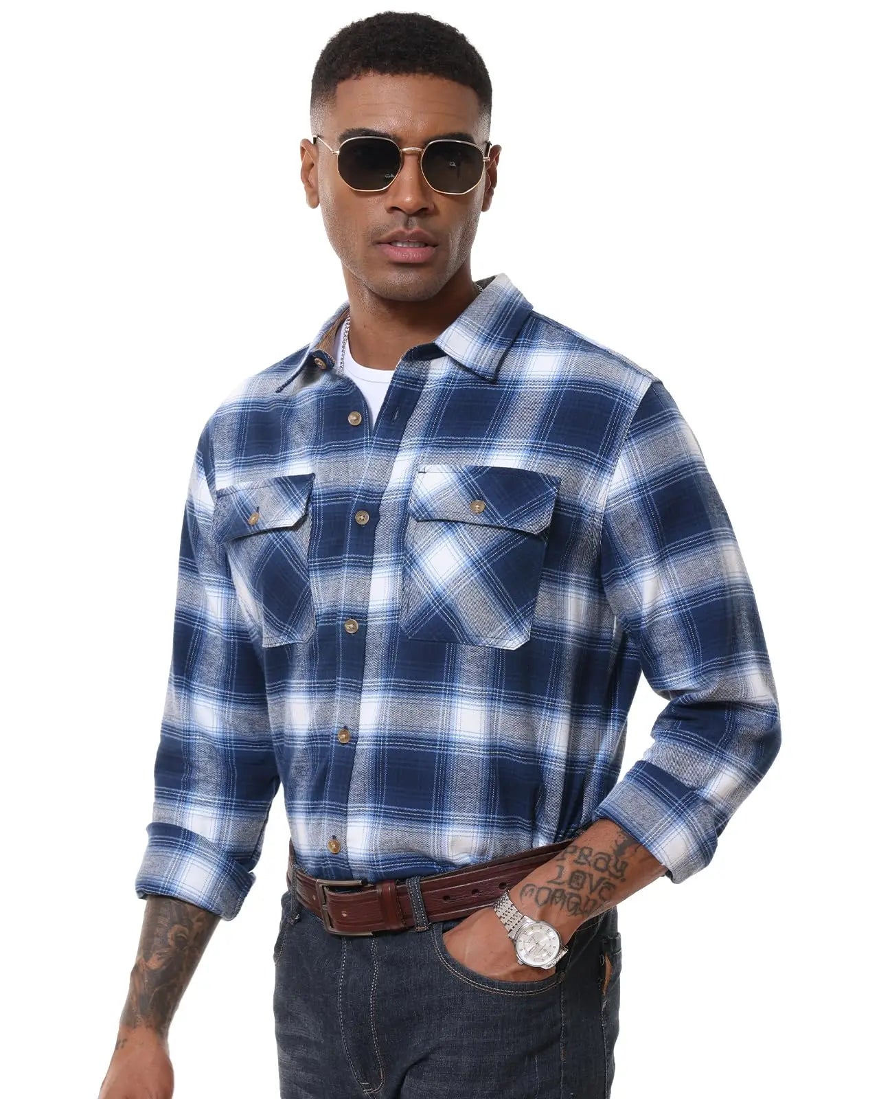 Man wearing a blue plaid shirt on a white background