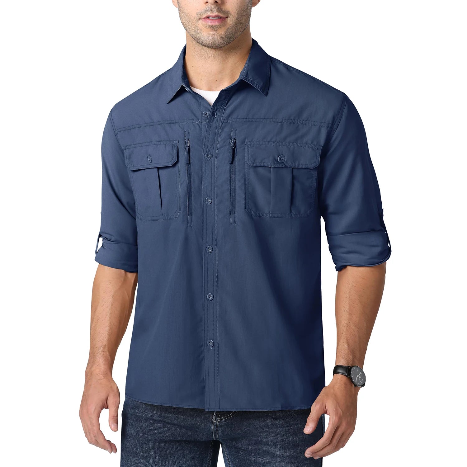 Man wearing a navy blue button-up shirt with rolled-up sleeves on a white background
